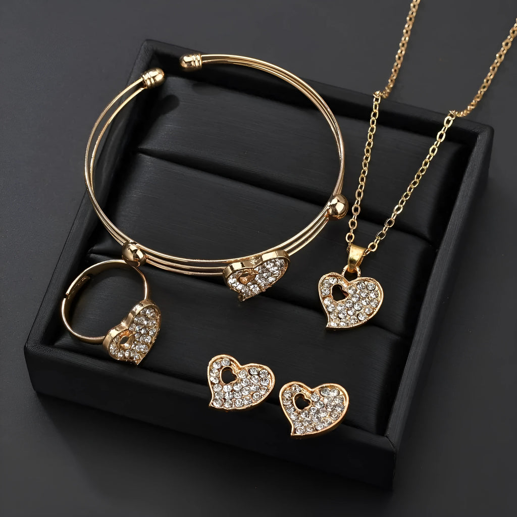 Gold electroplated alloy jewellery set with earrings, pendant, and bracelet featuring love, water drop, or bell patterns