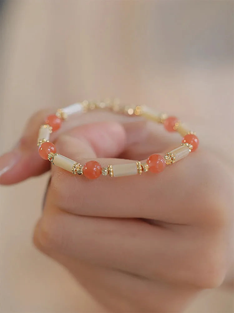 Hetian jade bamboo joint bracelet 6mm bead size on display against neutral background