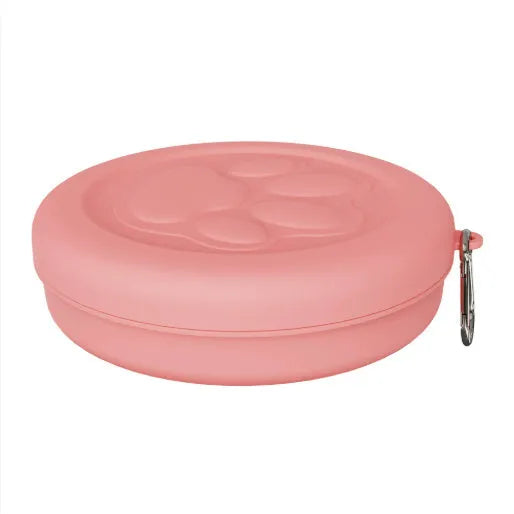Portable collapsible silicone dog bowl with a clip-on snack compartment lid in green and pink colours