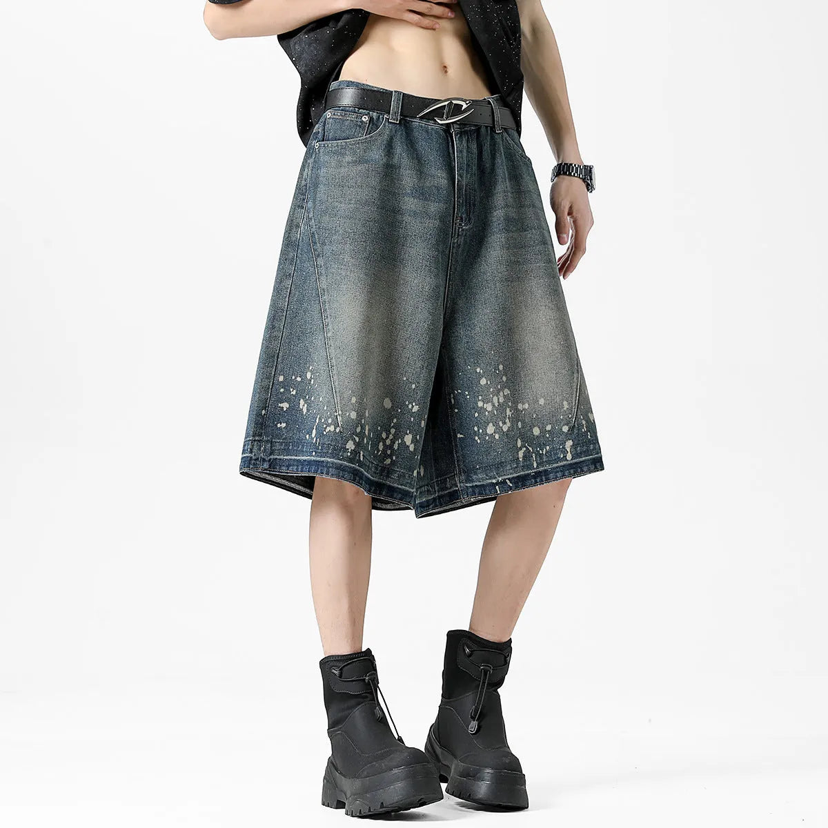 Men's retro blue denim shorts with ripped details and splash ink pattern