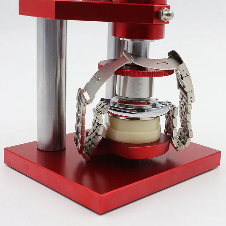 Watch repair spiral presser tool with a set of 20 plastic moulds for case backs on a grey surface