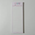 B5 half-size notepad with vertical English words printing in pink, purple, and blue cover colours.