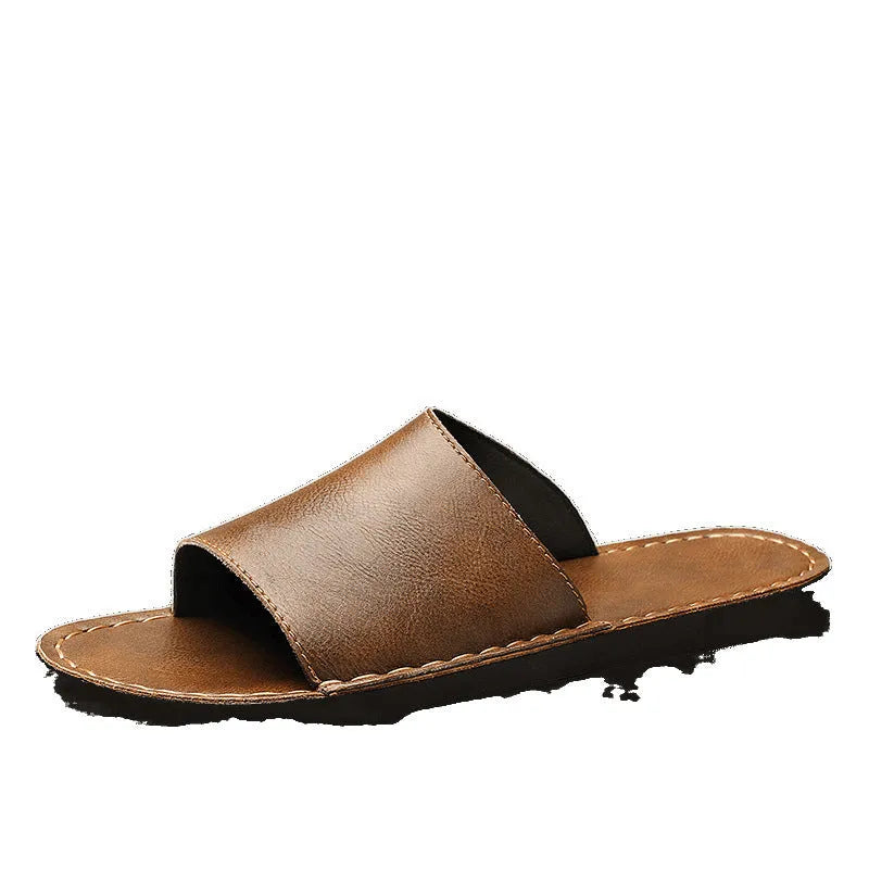 Brown men's leather sandal with rubber sole on a white background