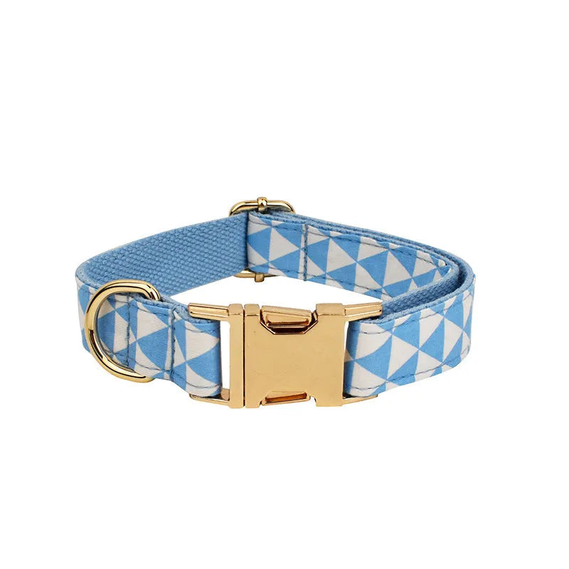 Blue four-piece dog set with collar, leash, bow, and vest in cloth material