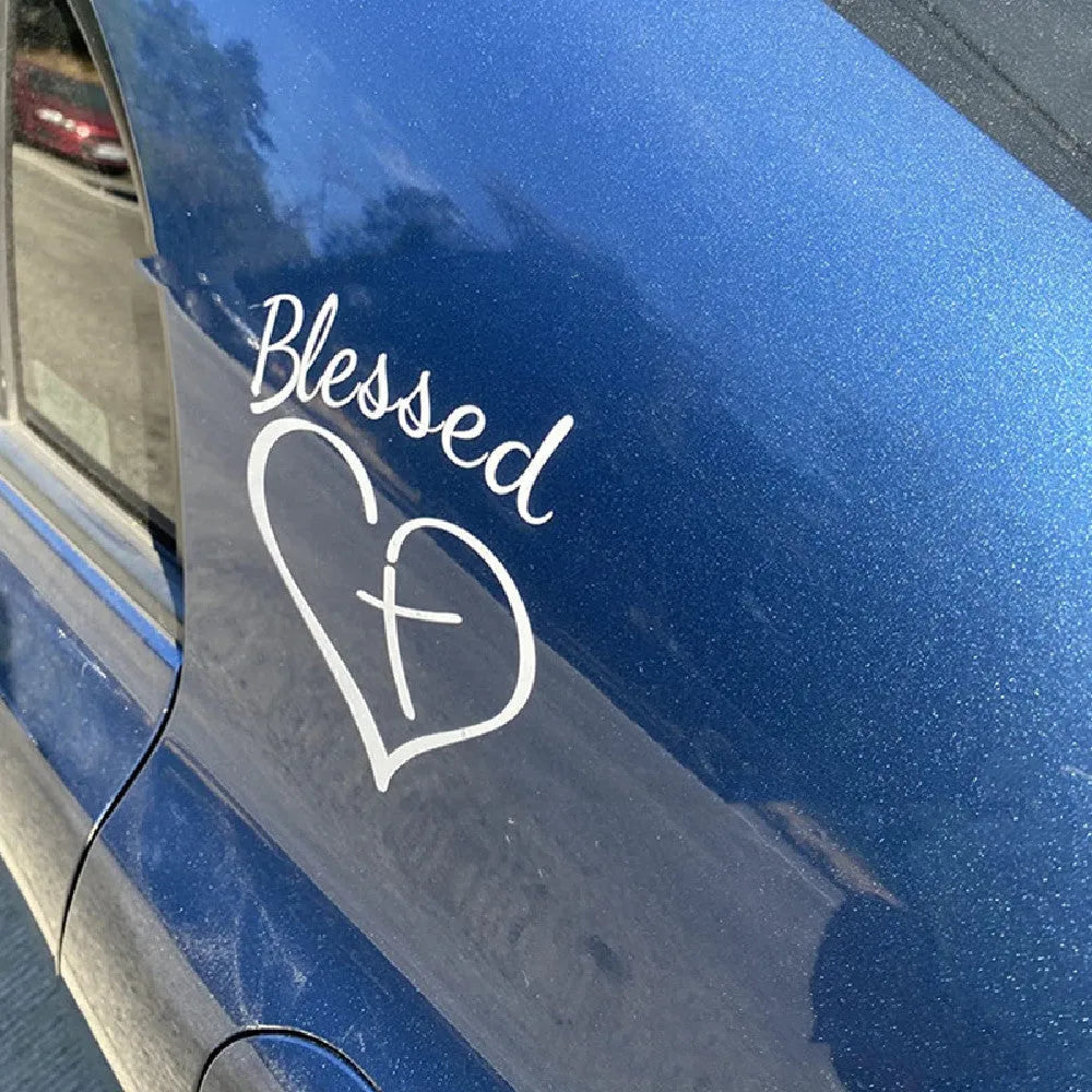 Faith Hope Love heart-shaped vinyl sticker in black, white and red colours measuring 14cm by 11.5cm