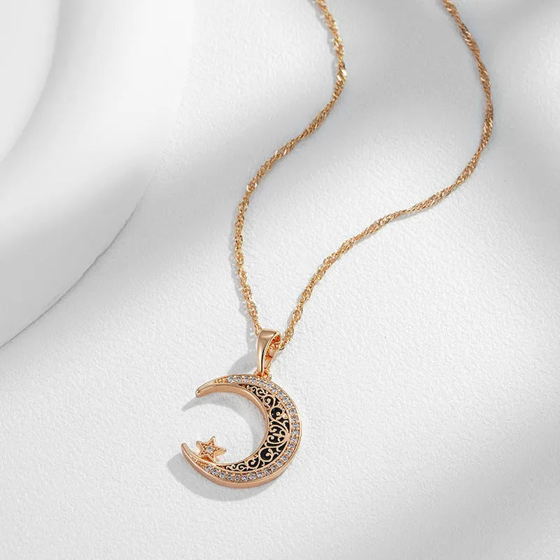 Rose gold star moon necklace with zircon pendant on adjustable water wave chain showing celestial design