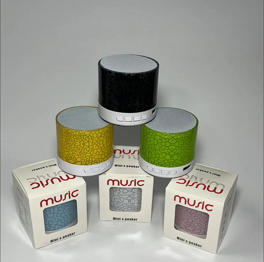 White A9 Mini Cracked Bluetooth Speaker with TF card slot and LED light