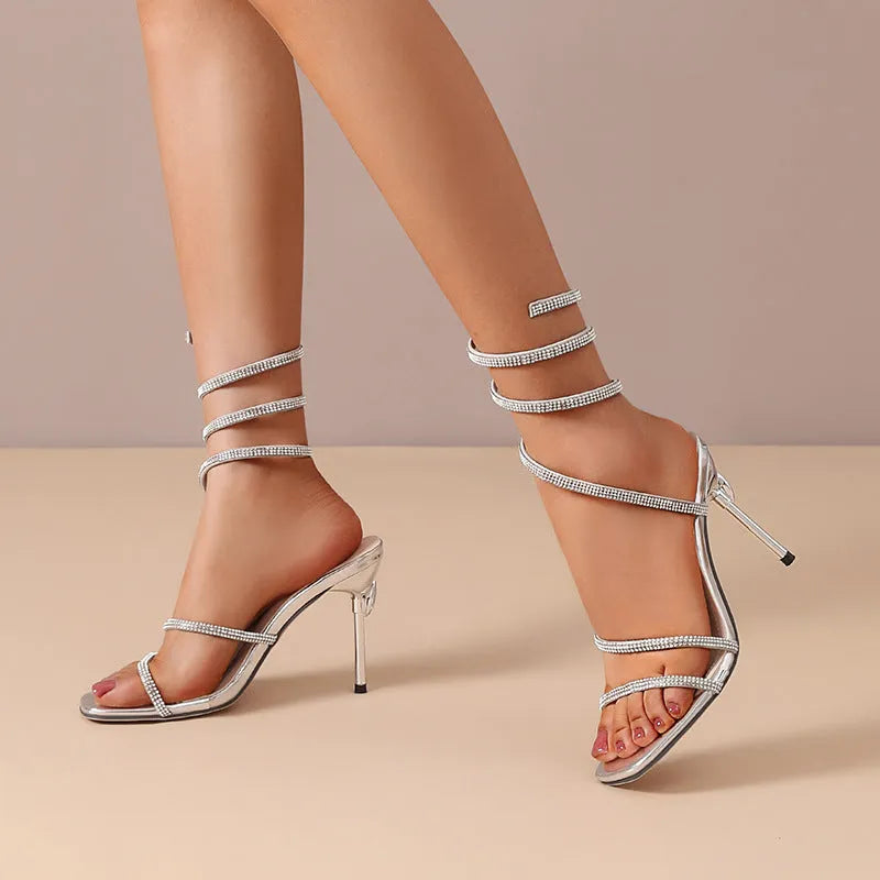Women's rhinestone snake-shaped winding tape hollow stiletto heel sandals square toe PU upper