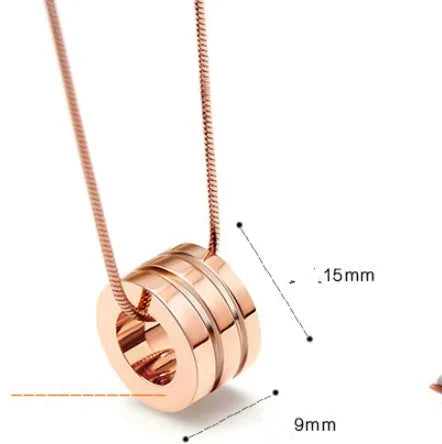 Screwdriver pendant necklace in titanium steel with 18K gold plating, shown in gold, rose gold, and steel colour at 45cm or 50cm.