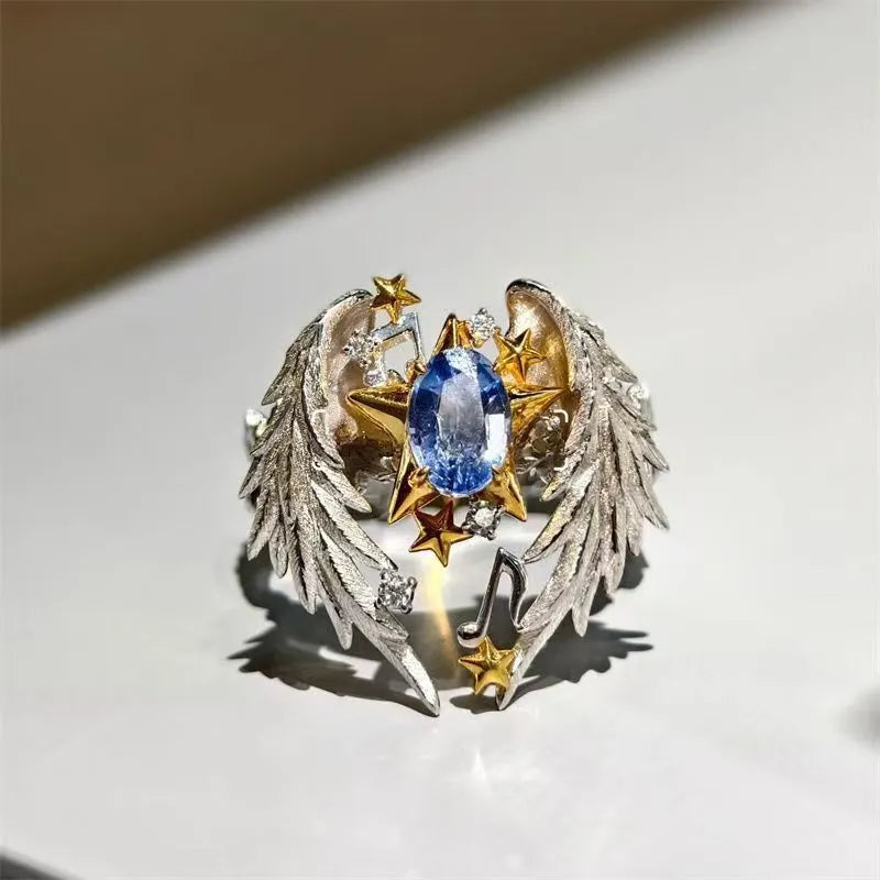 Adjustable angel wing ring with geometric design and open mouth styling