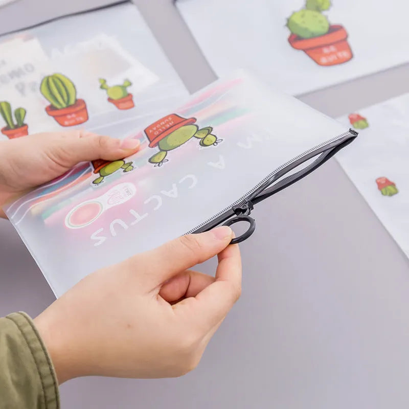 PVC sealed pencil case with cactus pattern, 17.1x21.2cm, on a desk