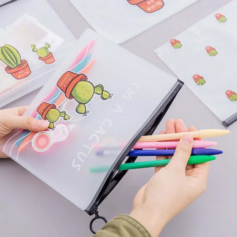 PVC sealed pencil case with cactus pattern, 17.1x21.2cm, on a desk