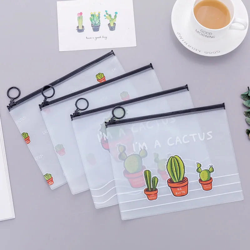 PVC sealed pencil case with cactus pattern, 17.1x21.2cm, on a desk