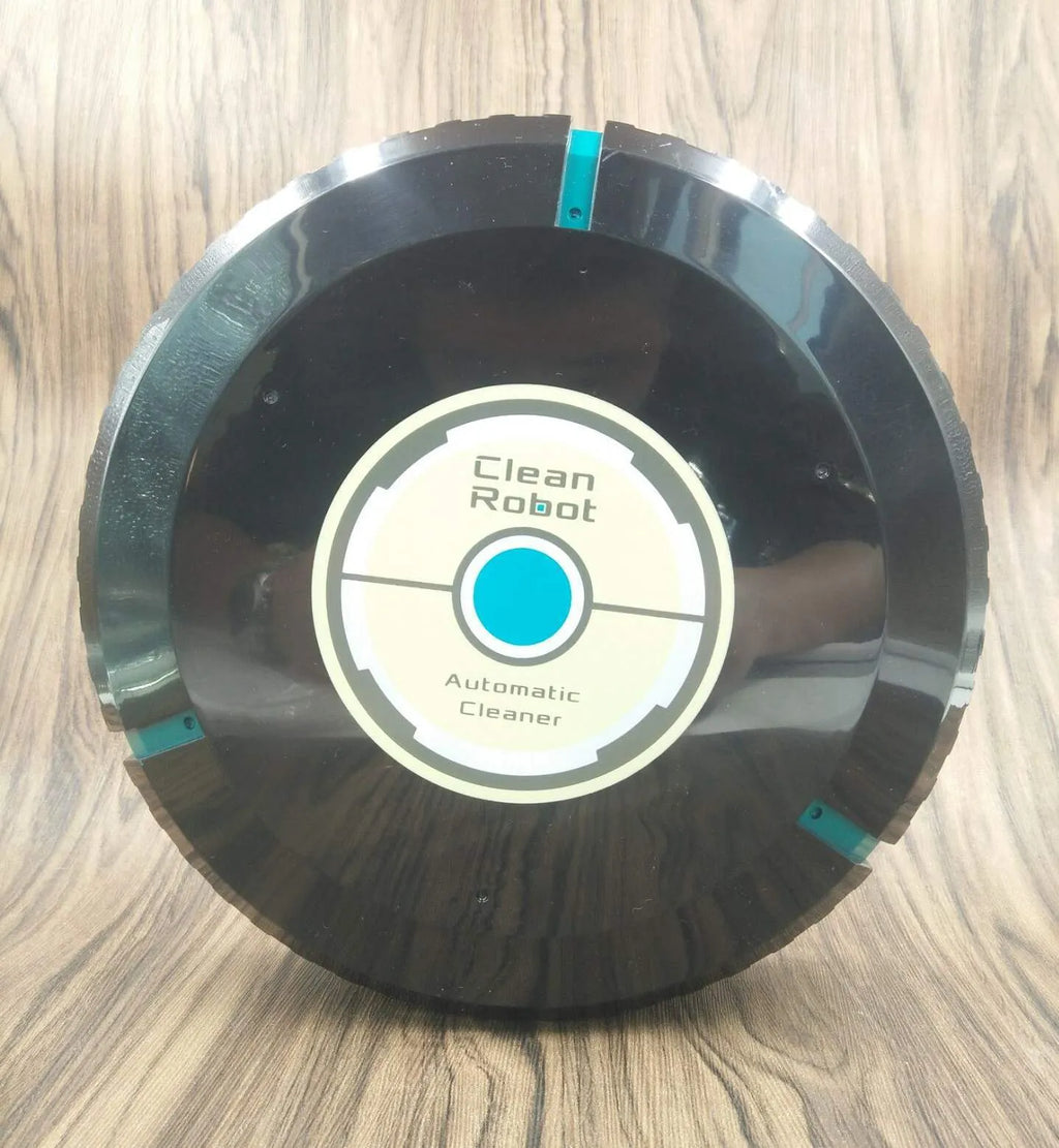 Black or white AC automatic sweeping robot on a hardwood floor next to a dust bin.
