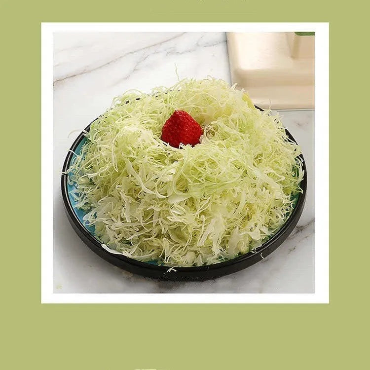 Beige stainless steel vegetable slicer and grater for kitchen use