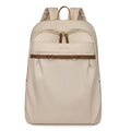 Large capacity Oxford cloth travel bag in black or beige with waterproof finish and multiple zip compartments