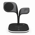 Black desktop wireless charging stand showing phone, watch and headphone charging simultaneously