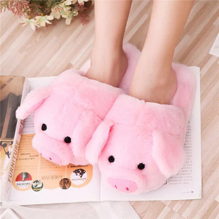Pink pig-shaped floor slippers made from short plush fabric.