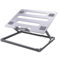 Super light aluminium alloy folding laptop cooling rack on a desk.