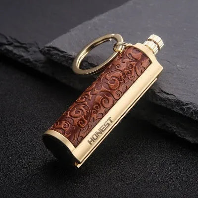 Windproof leather lighter with personality metal sticker in red, black, reddish-brown or yellow leather.