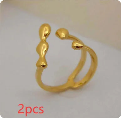 Brass opening ring with spherical design in gold or silver colour for women