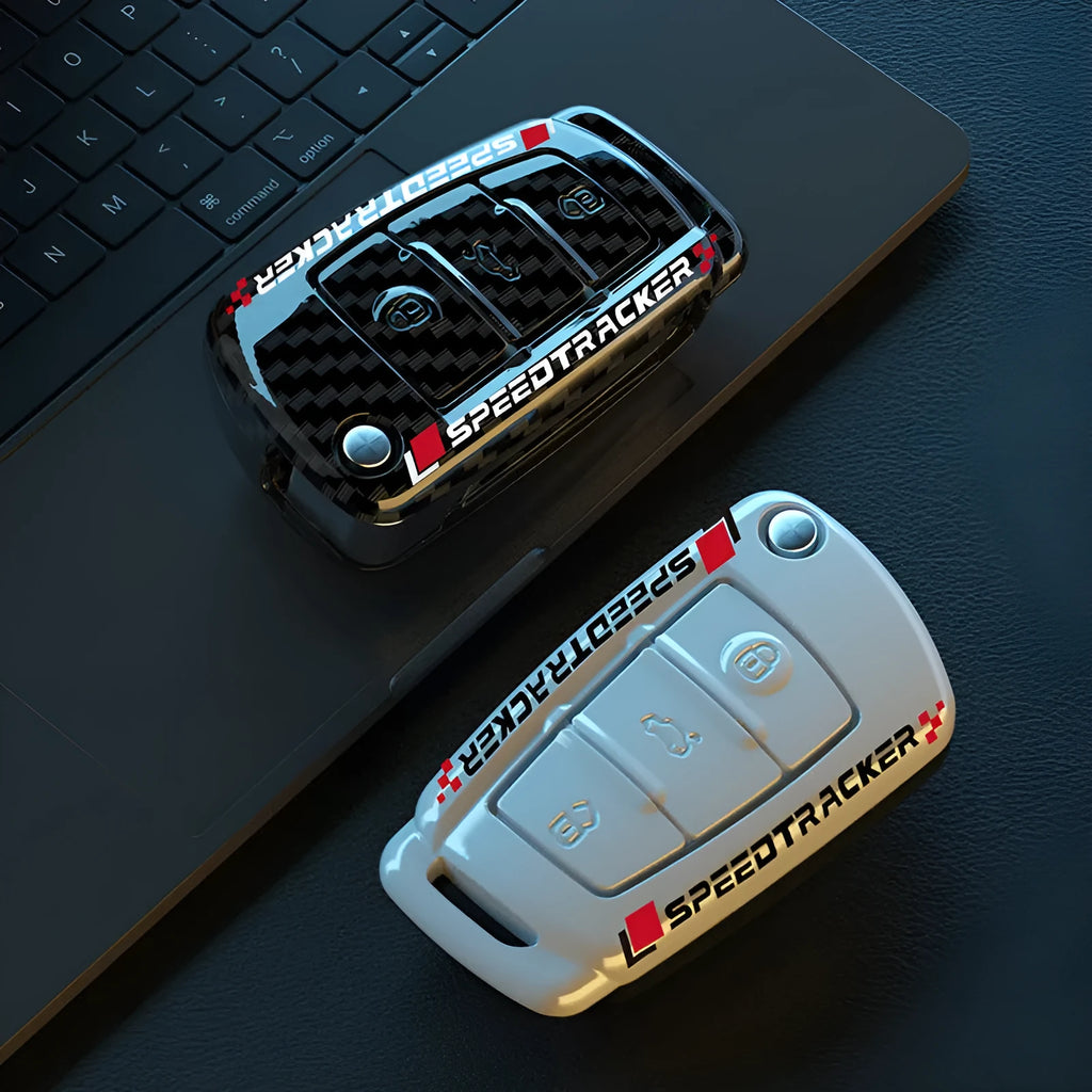 Carbon fibre style car key cover with mirror elements in carbon and white colours