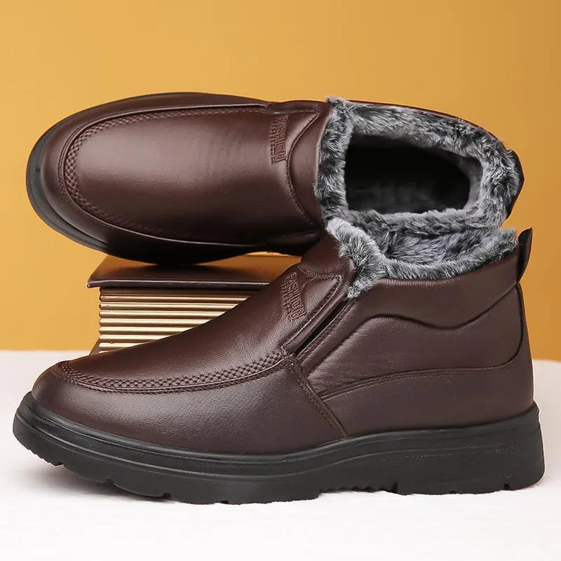 Men's black fleece-lined winter slip-on shoe with a non-slip rubber sole, shown on a size 45 foot.