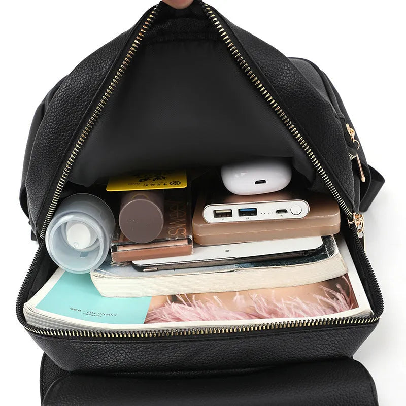 Casual women's leather backpack in street trend style with three-dimensional pockets