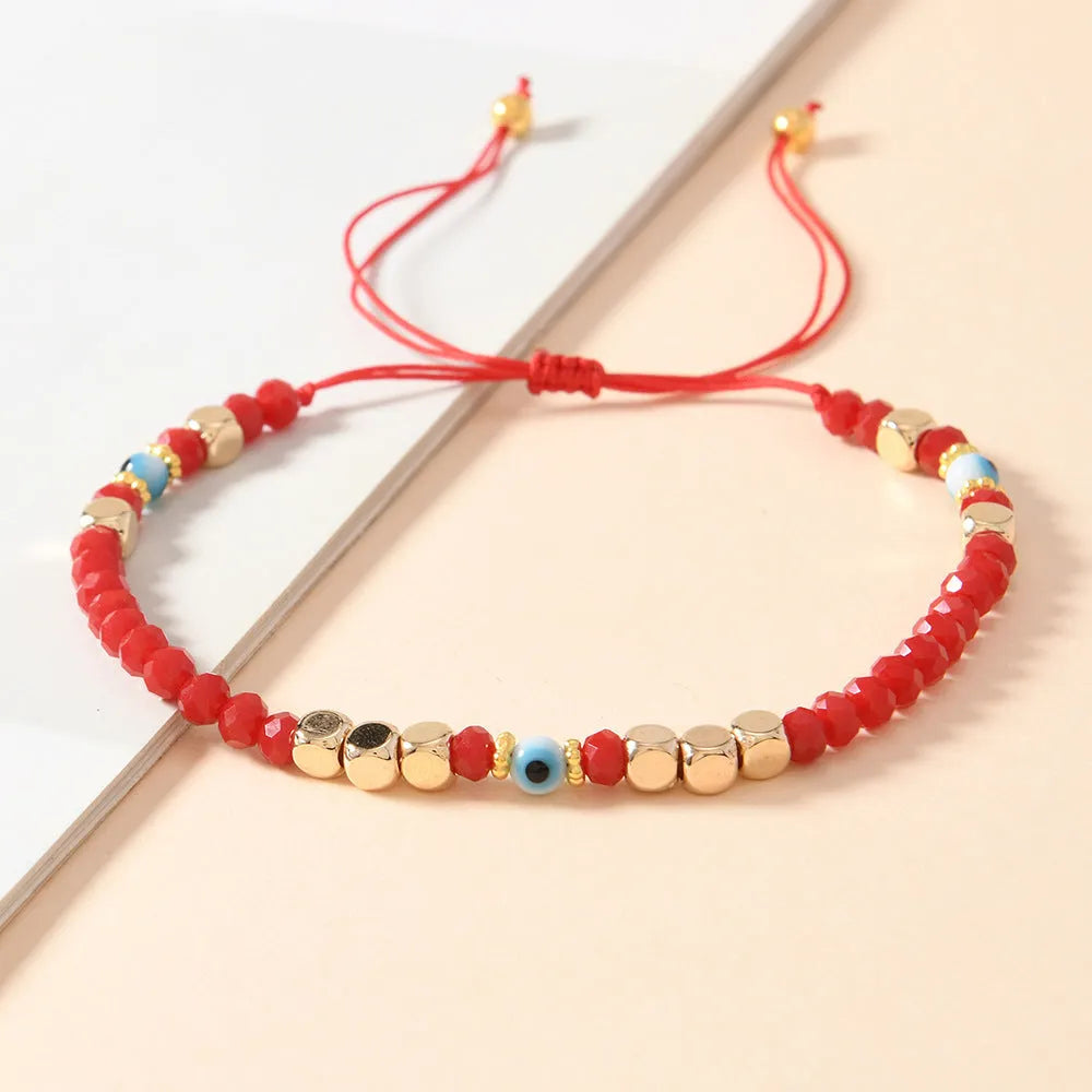 Red hand-woven artificial crystal beaded couple bracelet with geometric eye design in ins style