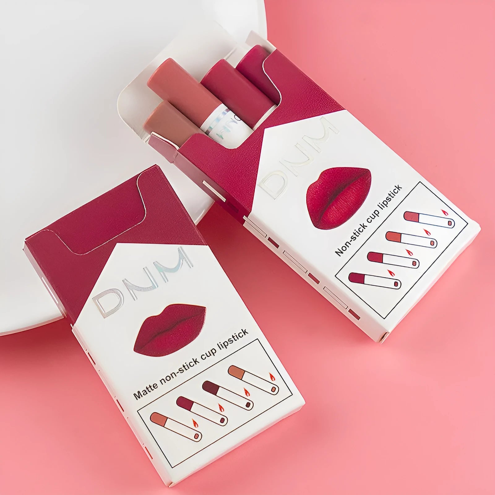 Non-stick lipstick set of 4 thin cigarette pipe lipsticks in assorted colours.