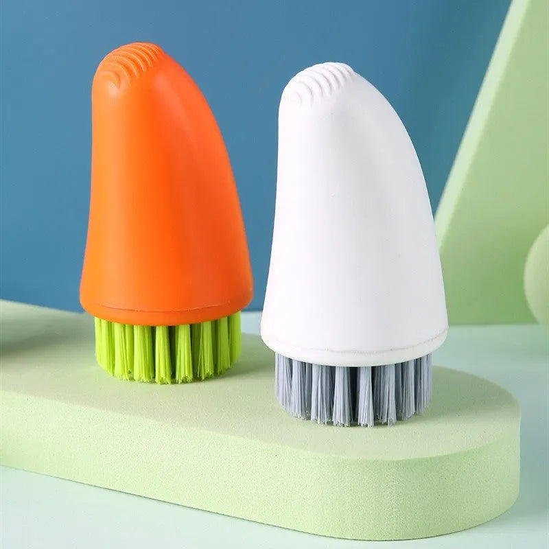 Carrot-shaped nylon cleaning brush in orange colour with radish pattern design