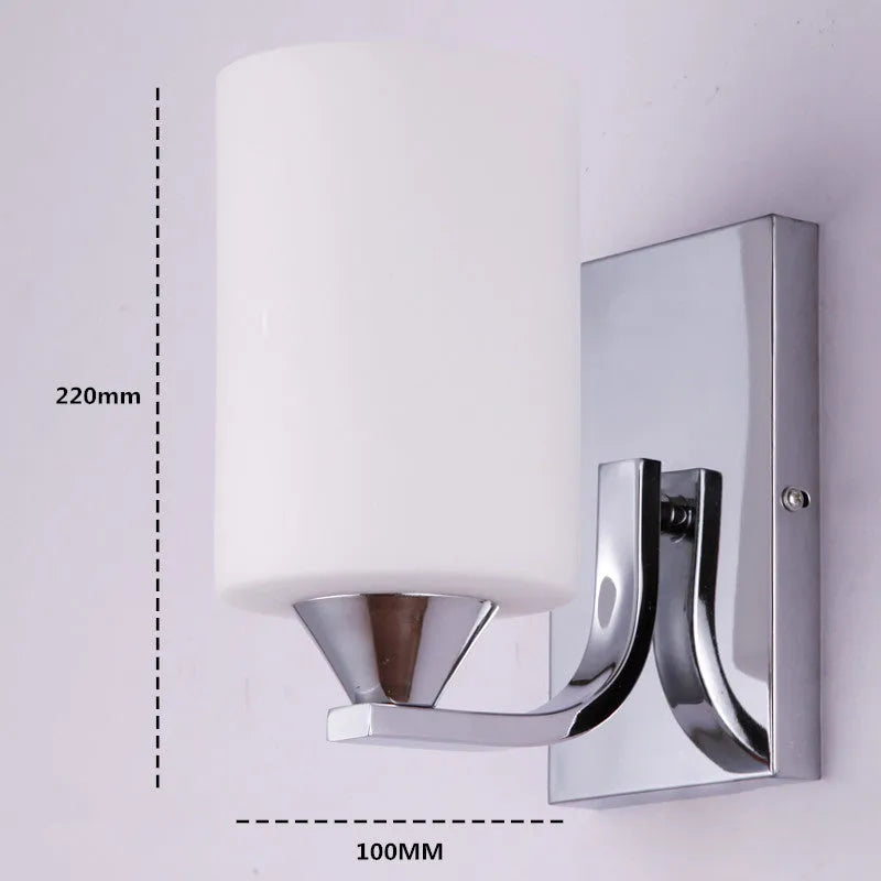 Minimalist chrome wall lamp with a glass shade shown in single head and double head configurations