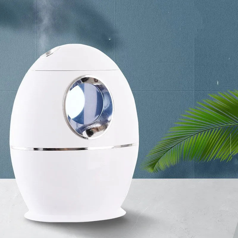 White columnar household air disinfection humidifier with USB cable on a table.