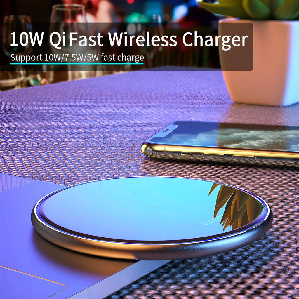 Black wireless charging pad with LED indicator light for phones and headphones