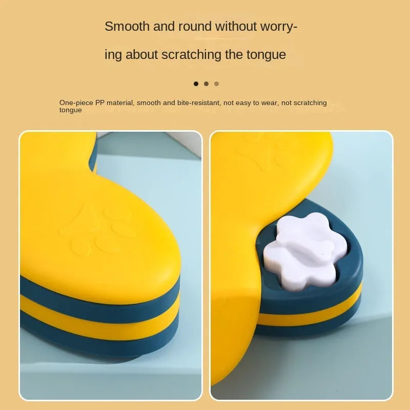 Green and yellow dog puzzle toy with bone covers and rotatable treat dispenser on non-slip base