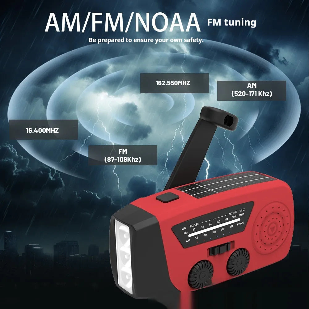 Red rechargeable emergency hand radio torch with USB port and wrist strap for disaster preparedness