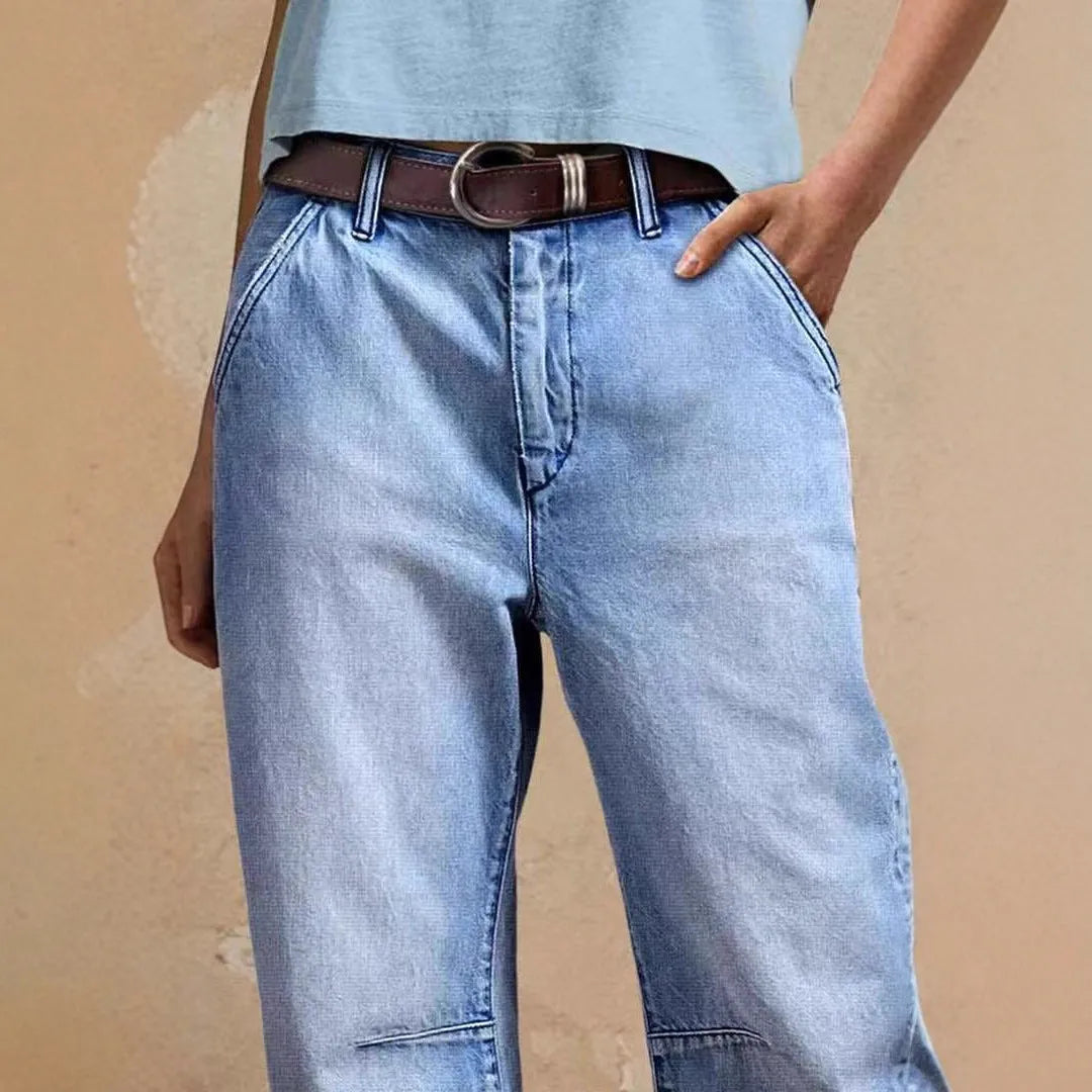 Casual cotton denim loose jeans trousers in light blue with washed finish, street hipster style