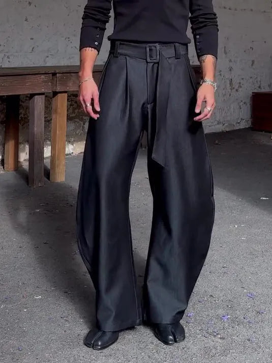 Chic black oversized wide-leg pants with high-waisted belt