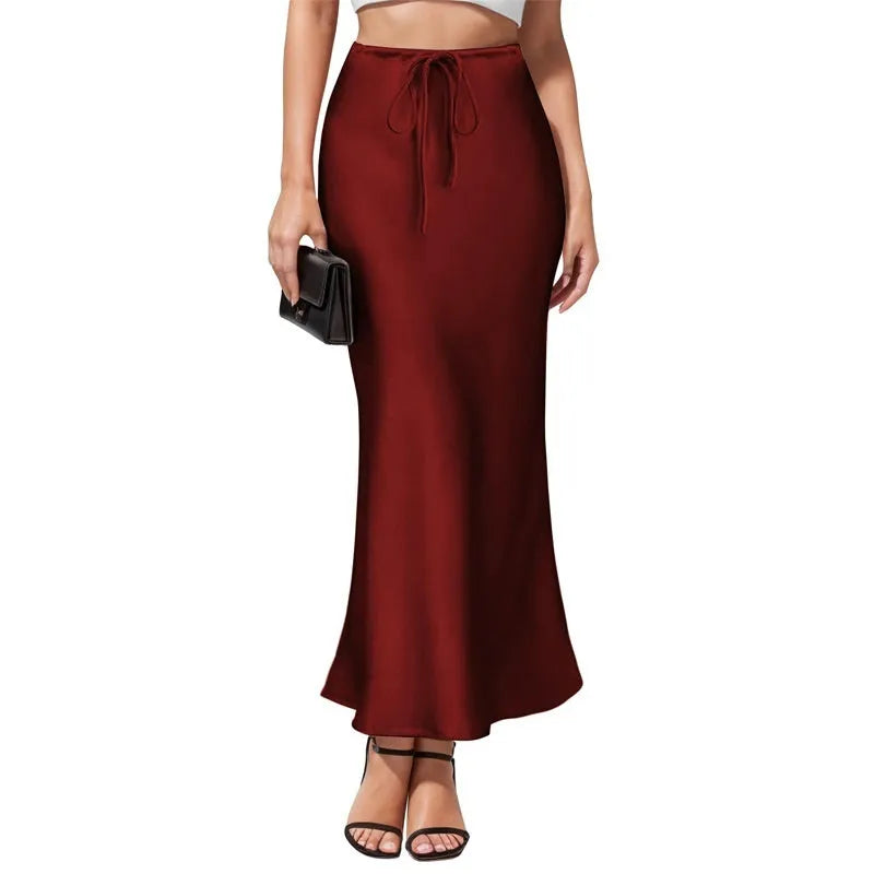 Asymmetric high waist skirt in acetate satin fabric with irregular stitching detail, shown in a choice of colours.