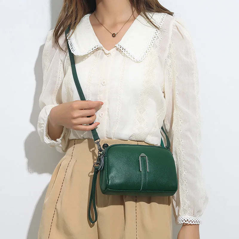 Genuine leather women's shoulder bag in horizontal square shape showing black, navy, green, brown colour options