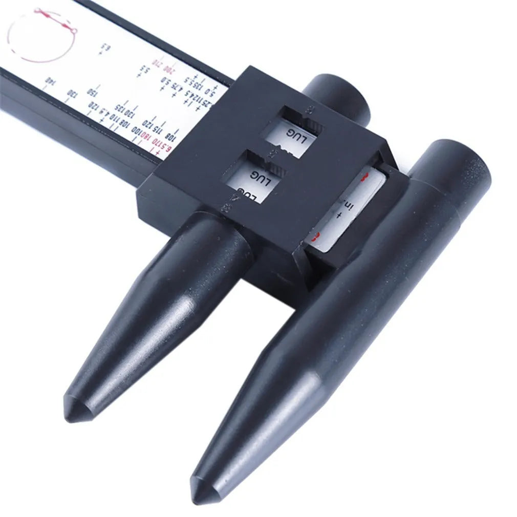 A plastic digital hole distance measuring tool with a display, shown measuring the space between two holes.