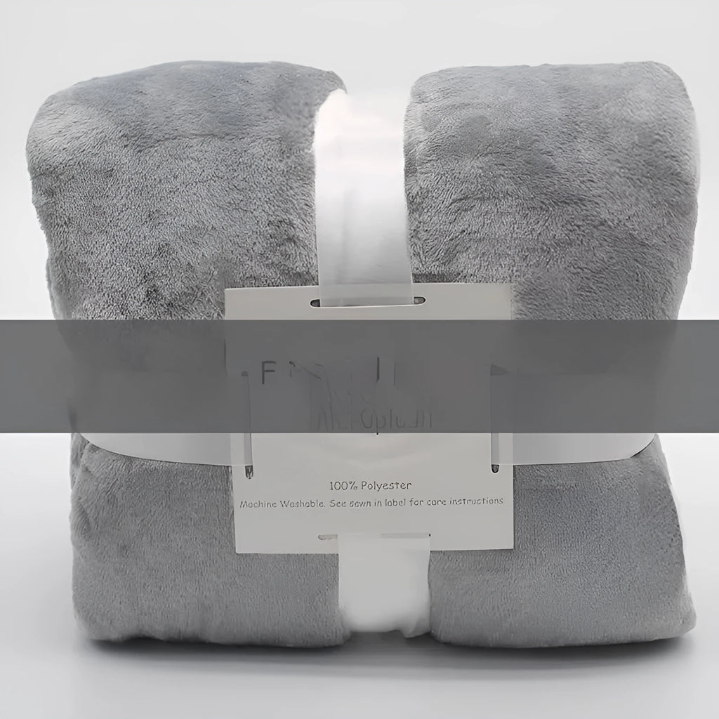 Light grey polyester coral flannel blanket for office naps and air conditioning, shown in a solid colour