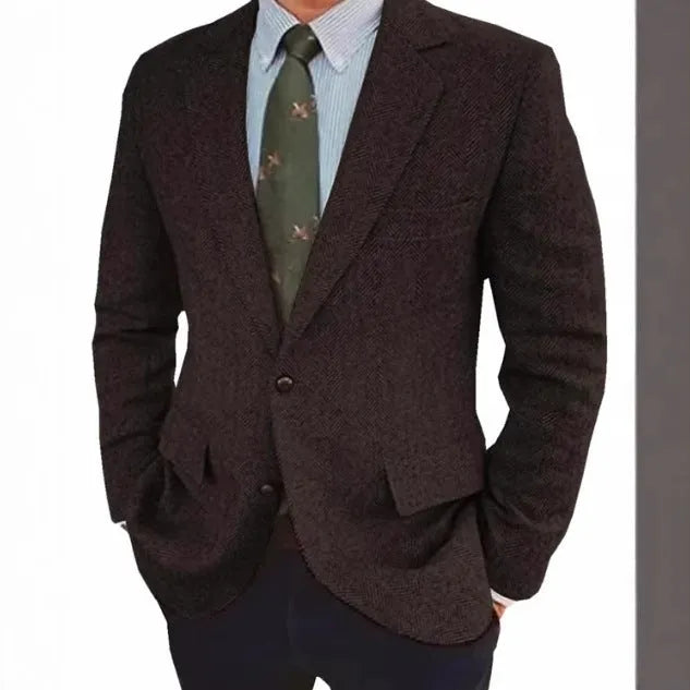 Man wearing a brown herringbone pattern retro-style suit jacket with long sleeves.