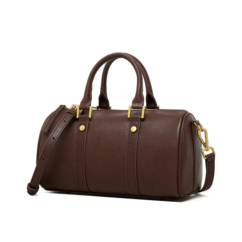 Retro portable cowhide crossbody bag in pillow shape with sewing thread detail, black colour