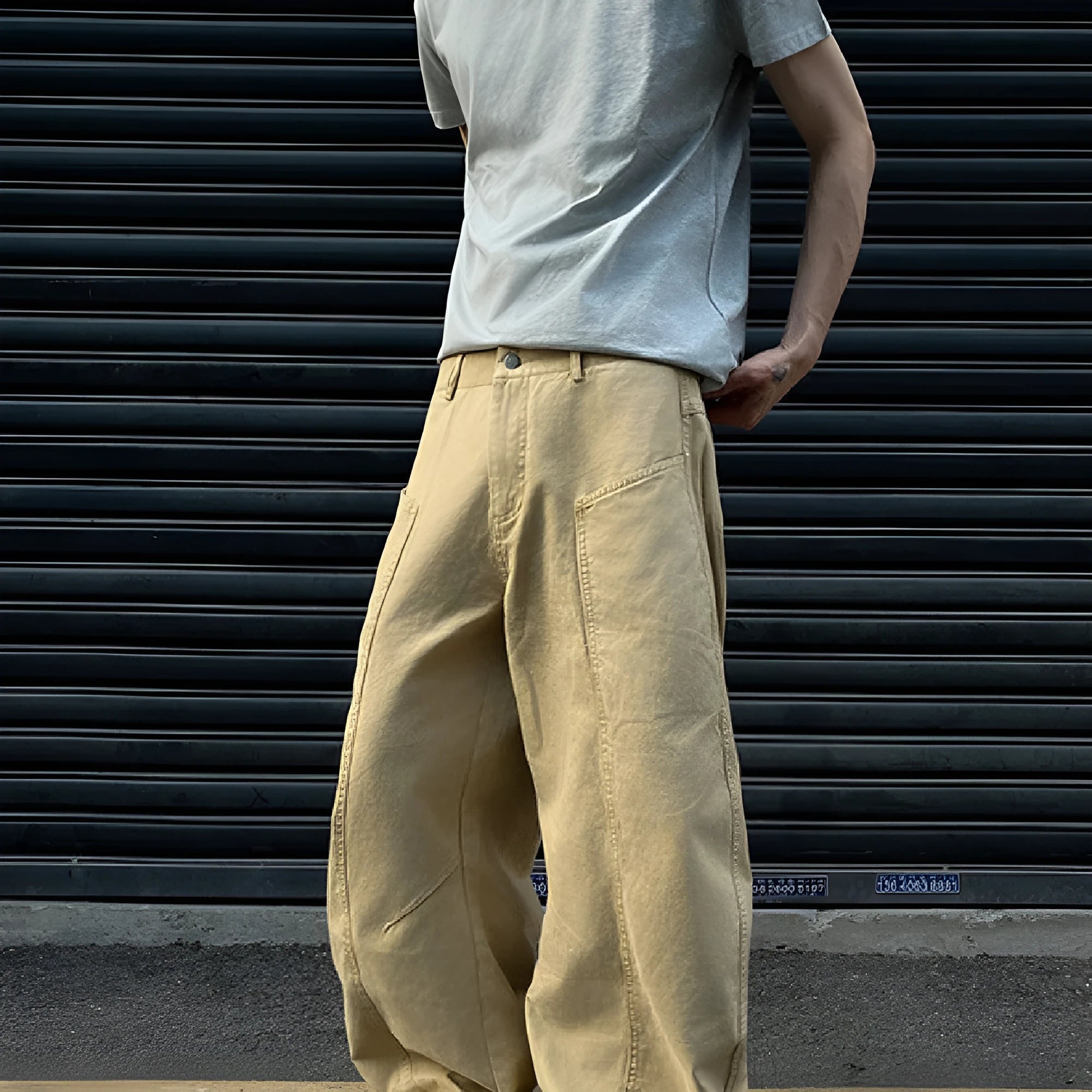 Men's khaki cotton trousers with straight leg cut and American retro styling on hanger