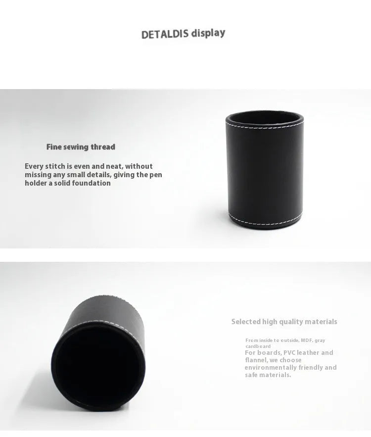 Small round black leather pen container on a desk