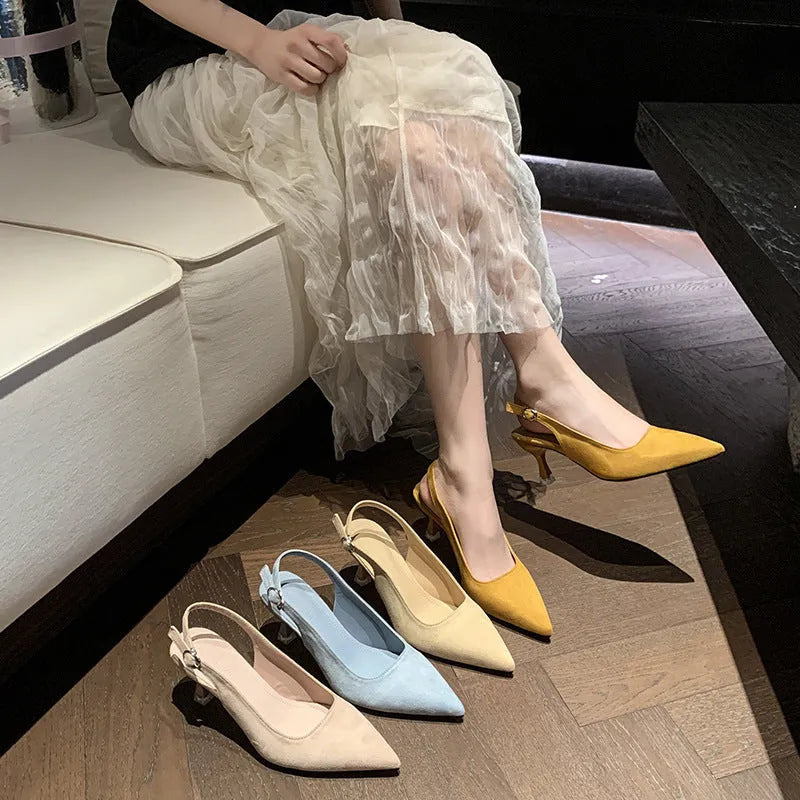 Women's apricot suede pointed-toe stiletto high heels on a neutral background.
