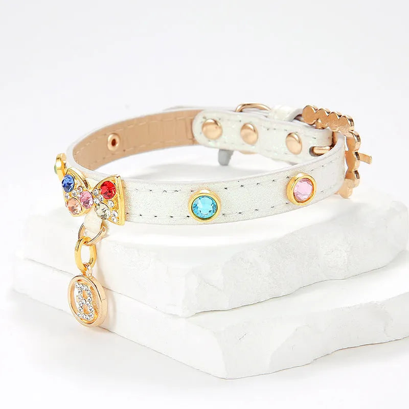 White PU cat collar with diamond alloy bow, 1.5cm wide, available in XS 26cm to L 38cm