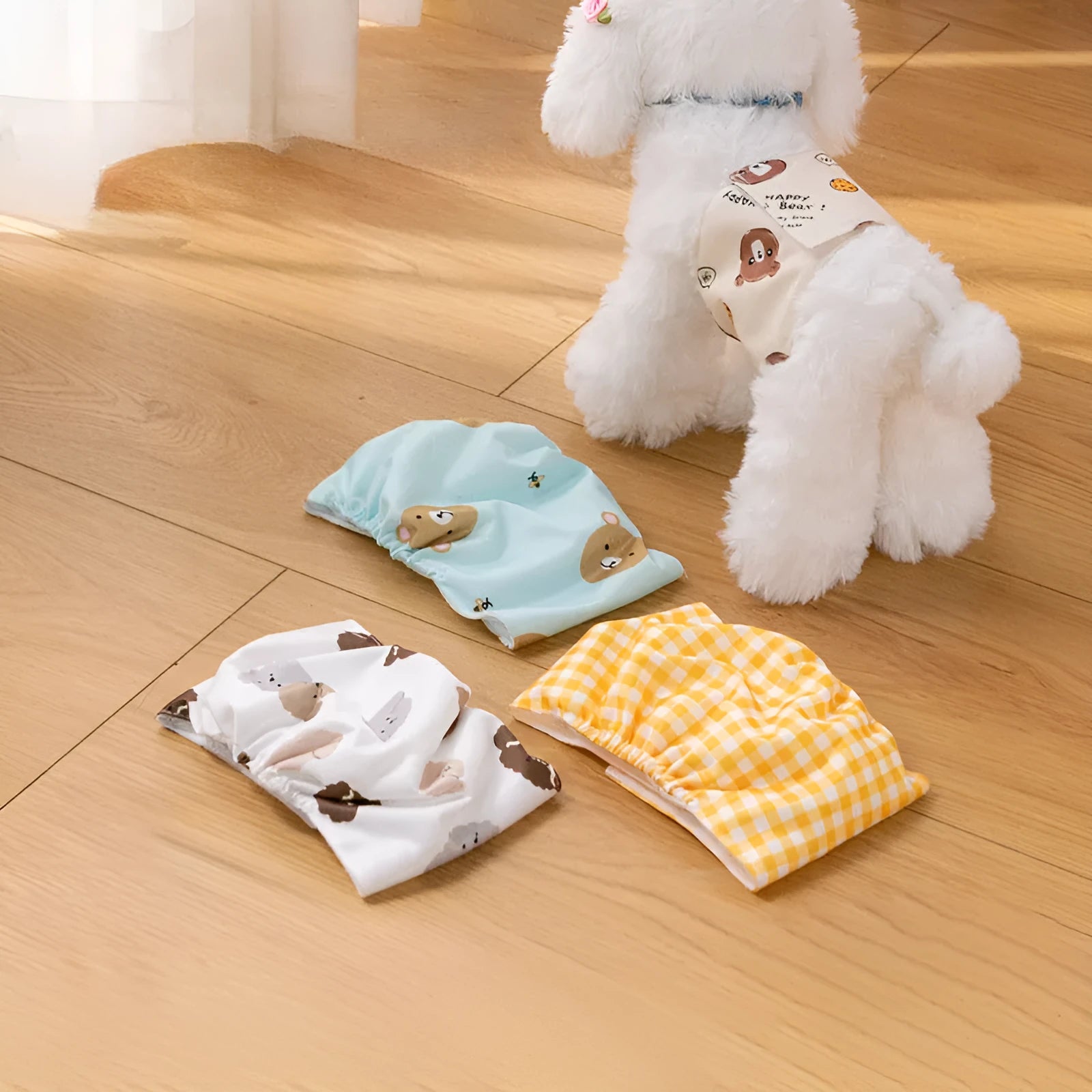 Reusable male dog diaper belly band in cartoon bone paw print pattern with fastener tape