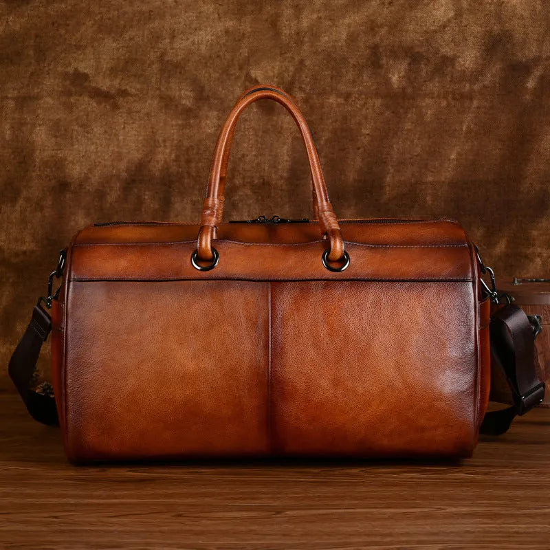 Handmade retro leather bag in vintage brown with below 20L capacity